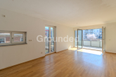 Wohn- und Esszimmer offener Balkon - Moderne 3-Zimmer-Eigentumswohnung mit Balkon und TG-Stellplatz
