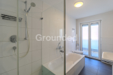 Badezimmer - Moderne Penthousewohnung mit großzügiger, umlaufender Dachterrasse und Tiefgaragen-Stellplatz