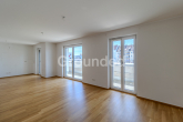 Wohnzimmer - Moderne Penthousewohnung mit großzügiger, umlaufender Dachterrasse und Tiefgaragen-Stellplatz