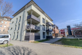 Rückansicht - Moderne Penthousewohnung mit großzügiger, umlaufender Dachterrasse und Tiefgaragen-Stellplatz