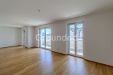 Wohnzimmer - Moderne Penthousewohnung mit großzügiger, umlaufender Dachterrasse und Tiefgaragen-Stellplatz