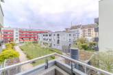Blick vom Balkon - Vermietete 2-Zimmer-Eigentumswohnung mit Balkon zzgl. TG-Stellplatz