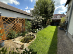 Garten - Gemütliche 3-Zimmer-Wohnung mit Stellplatz und Loggia