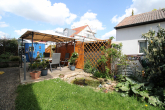 Garten - Gemütliche 3-Zimmer-Wohnung mit Stellplatz und Loggia