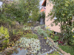 Gepflegtes Einfamilienhaus mit Wärmepumpe und ausgiebigem Garten in Pommersfelden - Gartenweg