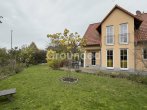 Gepflegtes Einfamilienhaus mit Wärmepumpe und ausgiebigem Garten in Pommersfelden - Rückansicht