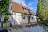 Hofansicht - Siedlerhaus mit Potential: gepflegtes Einfamilienhaus mit Garage und Garten in Nürnberg