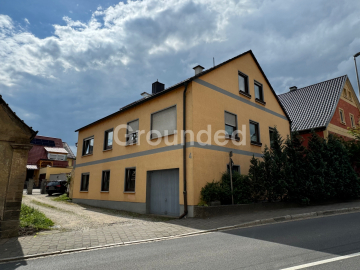Charmantes Mehrfamilienhaus mit drei Wohneinheiten in Baunach, 96148 Baunach, Mehrfamilienhaus