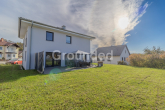 Gartenansicht (2) - Neuwertiges, energieeffizientes Einfamilienhaus mit Garten und Garage in Oberaurach