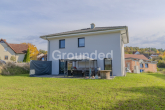 Gartenansicht (1) - Neuwertiges, energieeffizientes Einfamilienhaus mit Garten und Garage in Oberaurach