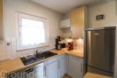 Küche (1) - Einmalige Chance: 3-Zimmer-Wohnung mit Carport und Option auf Roof-Top-Wintergarten