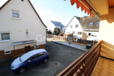 Aussicht Balkon - Sanierung oder Abriss: Einfamilienhaus mit Garten und Garage