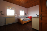 Kinderzimmer 1.OG (1) - Mischgebäude mit Wohn- und Gewerbeeinheiten, 30 kWp PV-Anlage und weitläufigem Garten