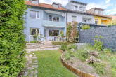 Garten - Gepflegtes Reihenmittelhaus mit großem Garten und Garage in Nürnberg